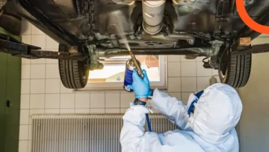 spraying sealant under the car